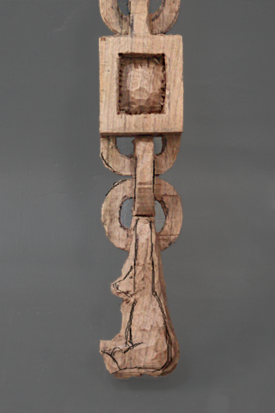 Roughed out lower components of chain 
		with centers carved out.