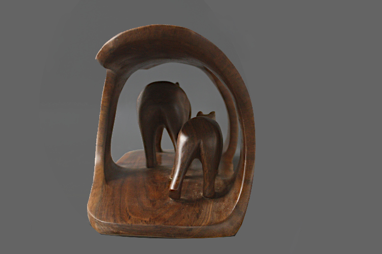 Bear and Cub Carved Within a Walnut Log